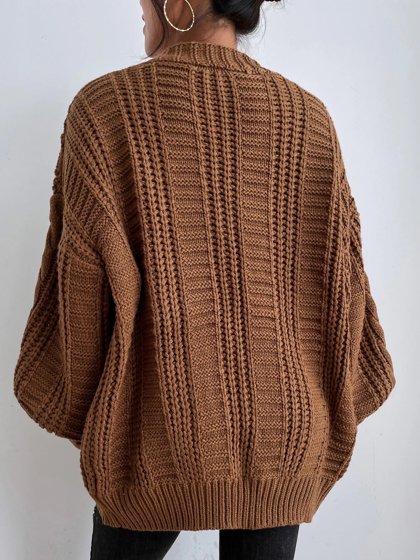Oversized cable knit cardigan with dropped shoulders, slouchy sleeves and ribbed trim