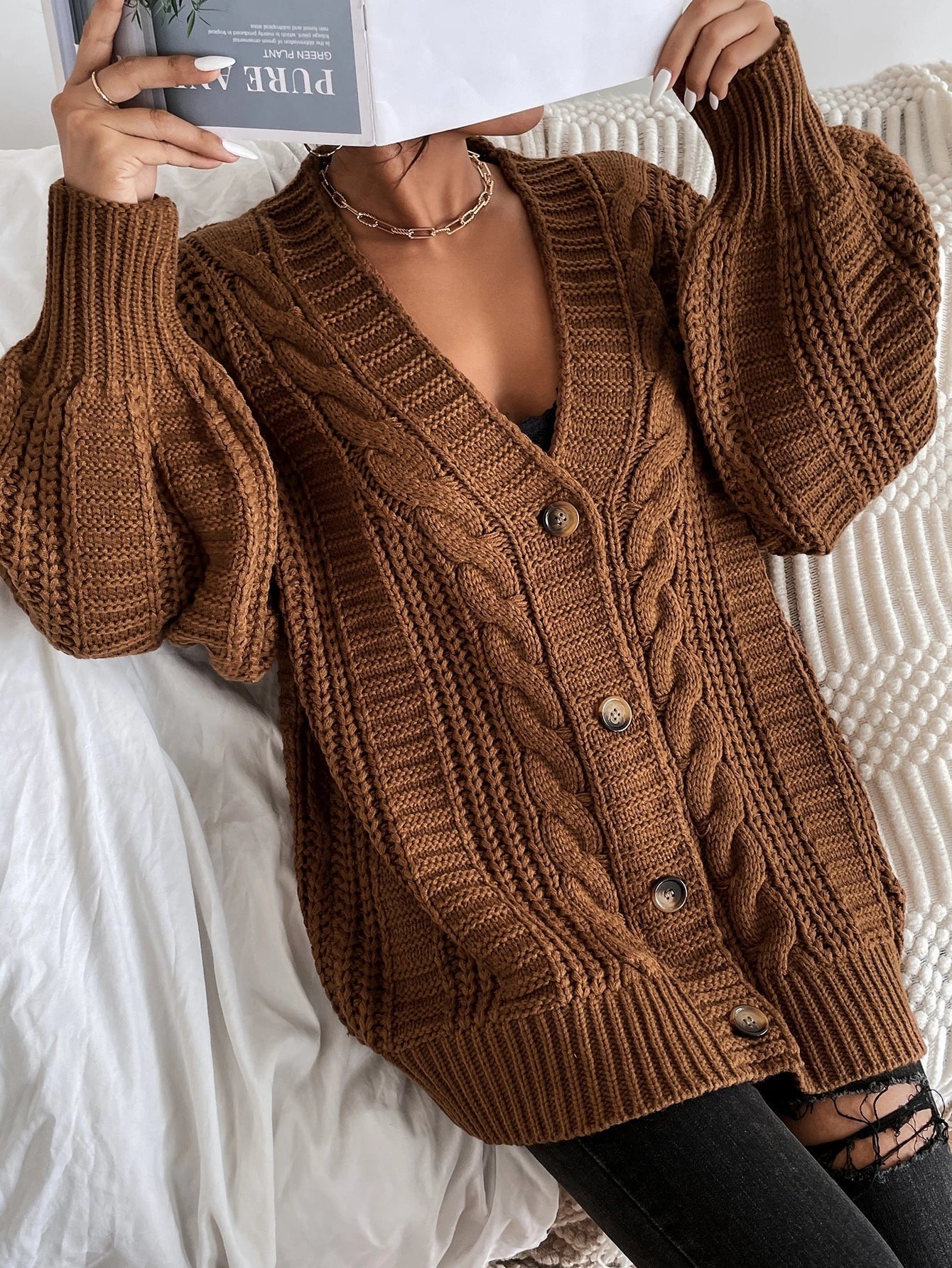 Oversized cable knit cardigan with dropped shoulders, slouchy sleeves and ribbed trim