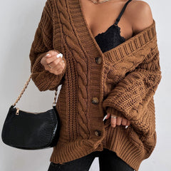 Oversized cable knit cardigan with dropped shoulders, slouchy sleeves and ribbed trim