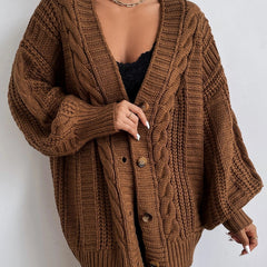 Oversized cable knit cardigan with dropped shoulders, slouchy sleeves and ribbed trim