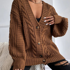 Oversized cable knit cardigan with dropped shoulders, slouchy sleeves and ribbed trim