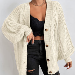 Oversized cable knit cardigan with dropped shoulders, slouchy sleeves and ribbed trim