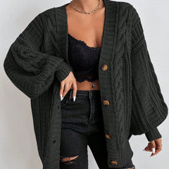 Oversized cable knit cardigan with dropped shoulders, slouchy sleeves and ribbed trim