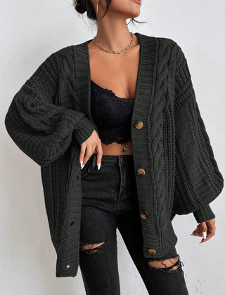 Oversized cable knit cardigan with dropped shoulders, slouchy sleeves and ribbed trim