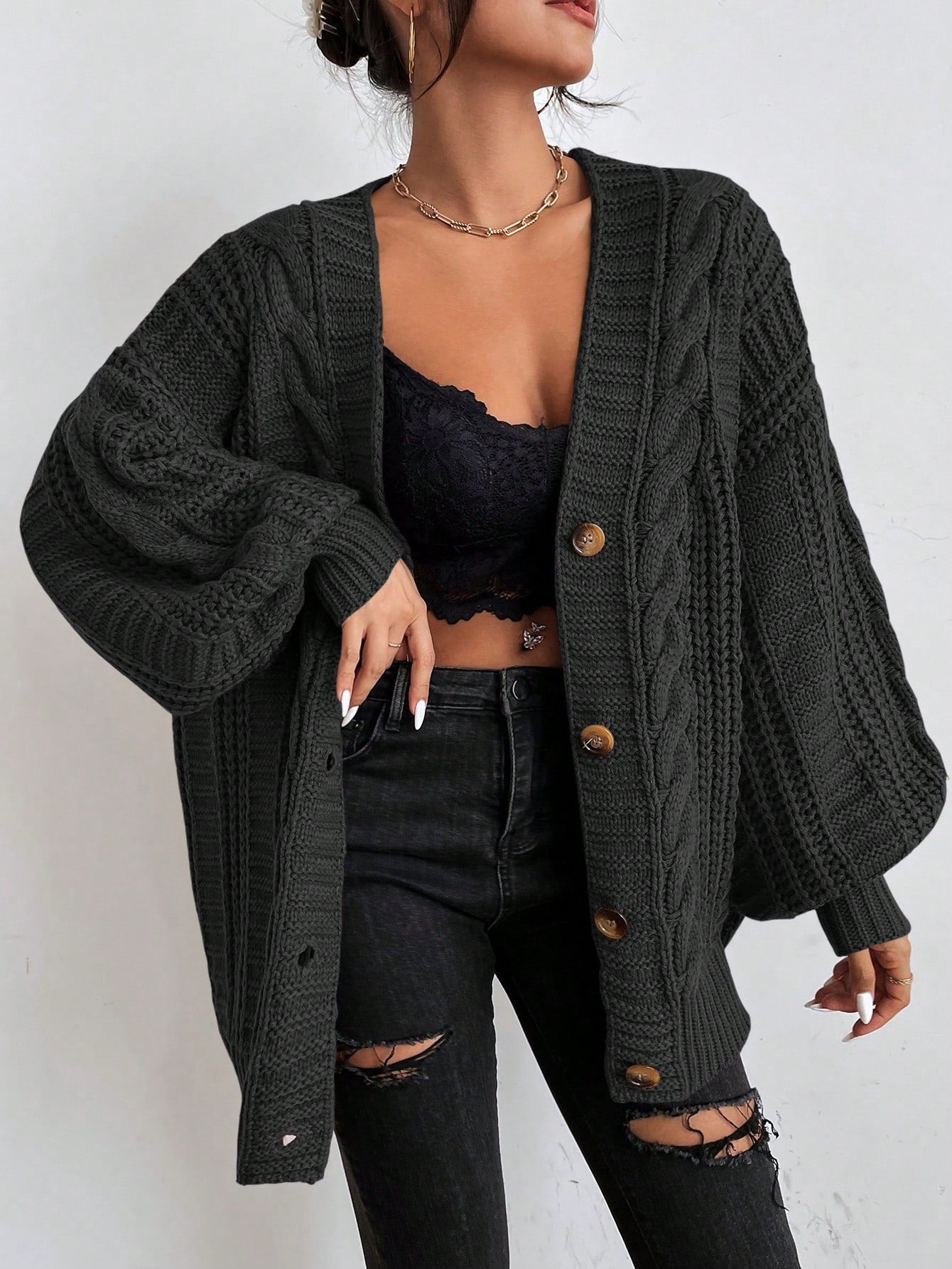 Oversized cable knit cardigan with dropped shoulders, slouchy sleeves and ribbed trim