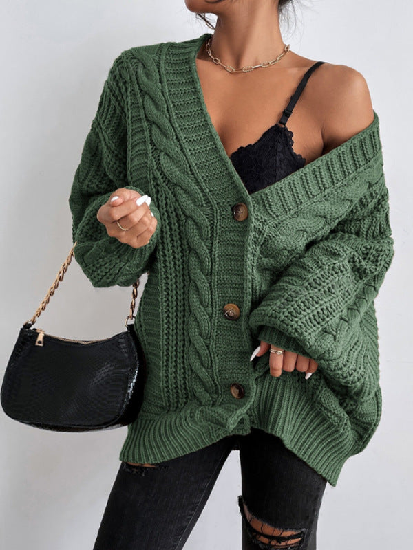 Oversized cable knit cardigan with dropped shoulders, slouchy sleeves and ribbed trim