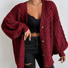 Oversized cable knit cardigan with dropped shoulders, slouchy sleeves and ribbed trim