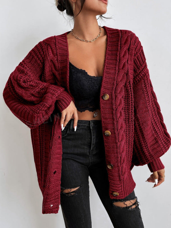 Oversized cable knit cardigan with dropped shoulders, slouchy sleeves and ribbed trim