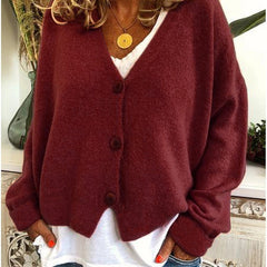 Women's V-neck button-front knit cardigan with long sleeves in a relaxed, slightly cropped fit