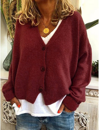 Women's V-neck button-front knit cardigan with long sleeves in a relaxed, slightly cropped fit