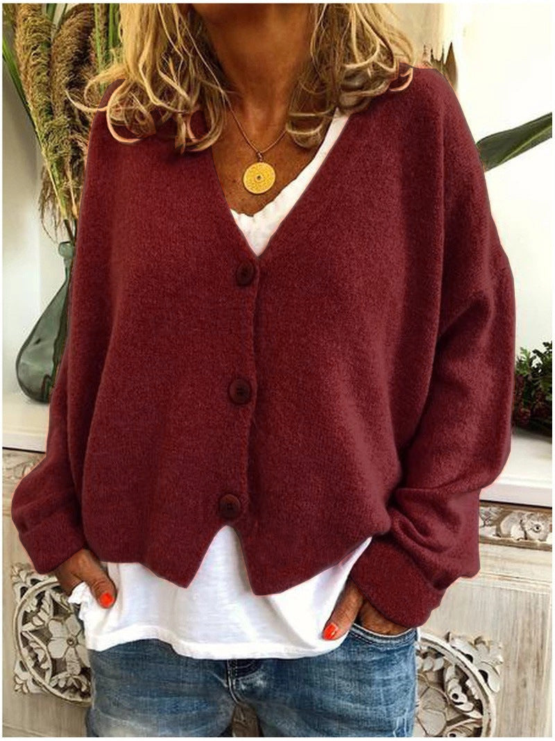 Women's V-neck button-front knit cardigan with long sleeves in a relaxed, slightly cropped fit