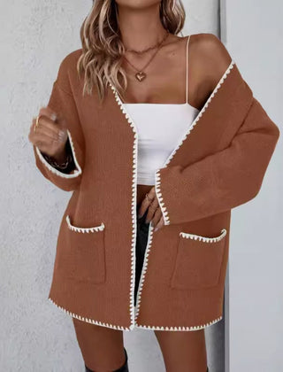 Open front long sleeve knit cardigan with front pockets in a relaxed drape