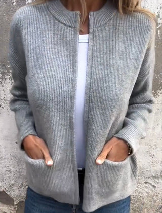 Women's minimal knit cardigan with front pockets in a neutral tone