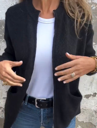 Women's minimal knit cardigan with front pockets in a neutral tone