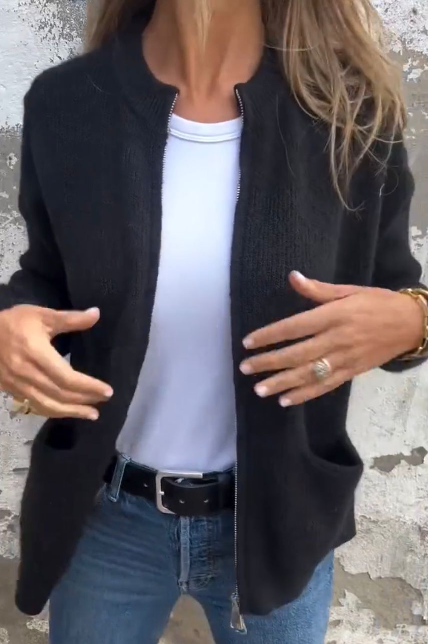 Women's minimal knit cardigan with front pockets in a neutral tone