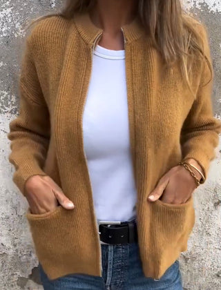 Women's minimal knit cardigan with front pockets in a neutral tone