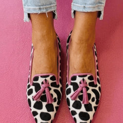 Pointed velvet loafers with animal print, bright pink trim and decorative tassels