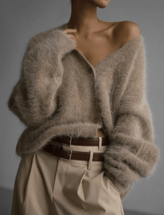 Fluffy knit cardigan with deep V-neck and oversized sleeves in neutral tones