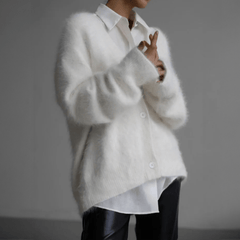 Fluffy knit cardigan with deep V-neck and oversized sleeves in neutral tones