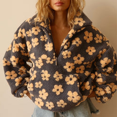 Women's floral quarter-zip sweater with stand collar and gathered cuffs in a relaxed fit