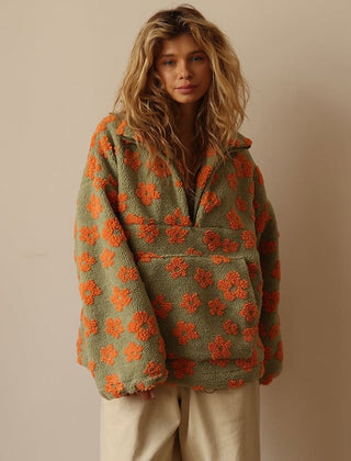 Women's floral quarter-zip sweater with stand collar and gathered cuffs in a relaxed fit