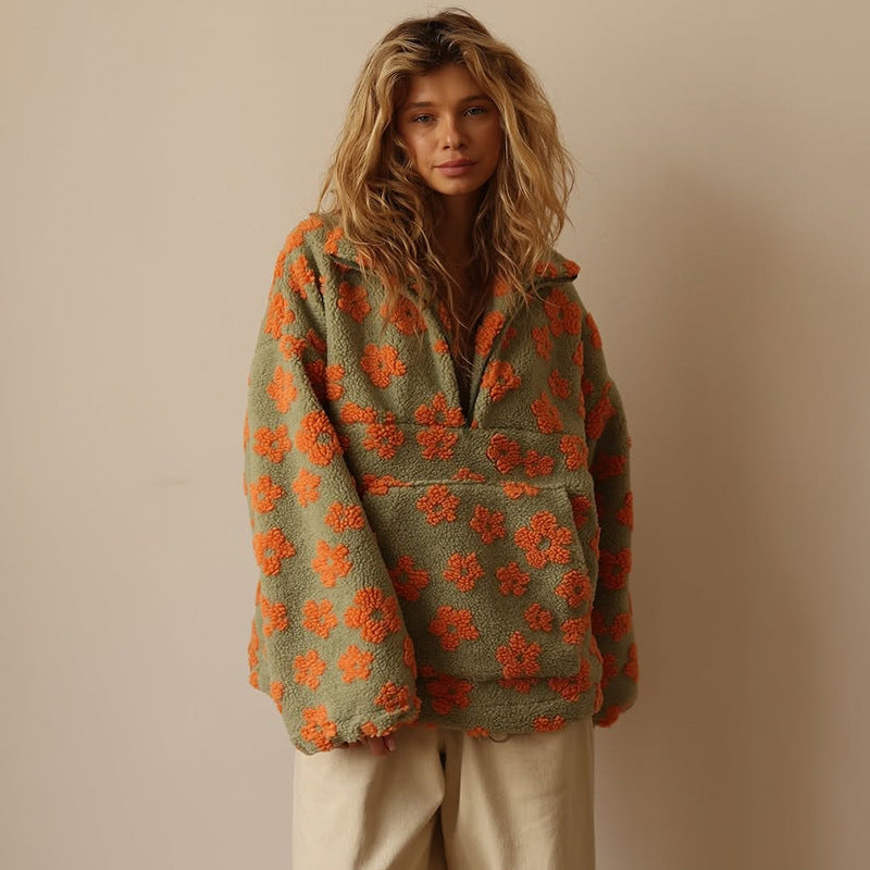 Women's floral quarter-zip sweater with stand collar and gathered cuffs in a relaxed fit