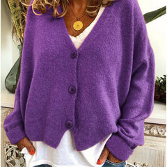 Women's V-neck button-front long sleeve cardigan with a relaxed hip-length fit