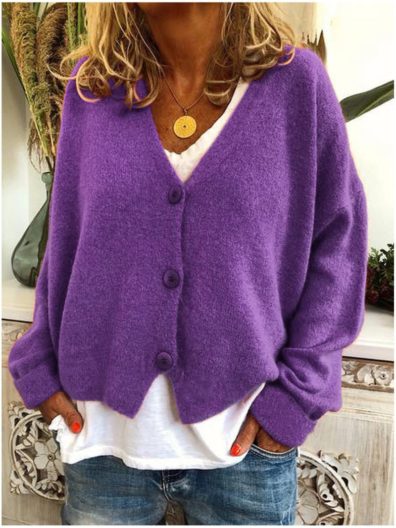 Women's V-neck button-front long sleeve cardigan with a relaxed hip-length fit