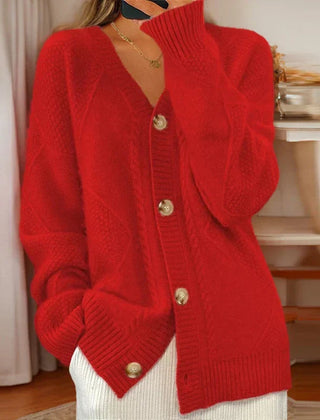 Cable knit button-front cardigan with long sleeves in soft neutral tones