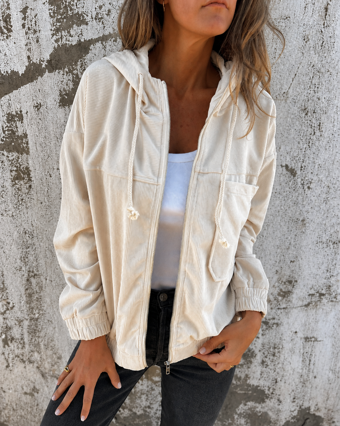 Natalie corduroy hooded zip-front jacket with side pockets and a relaxed fit