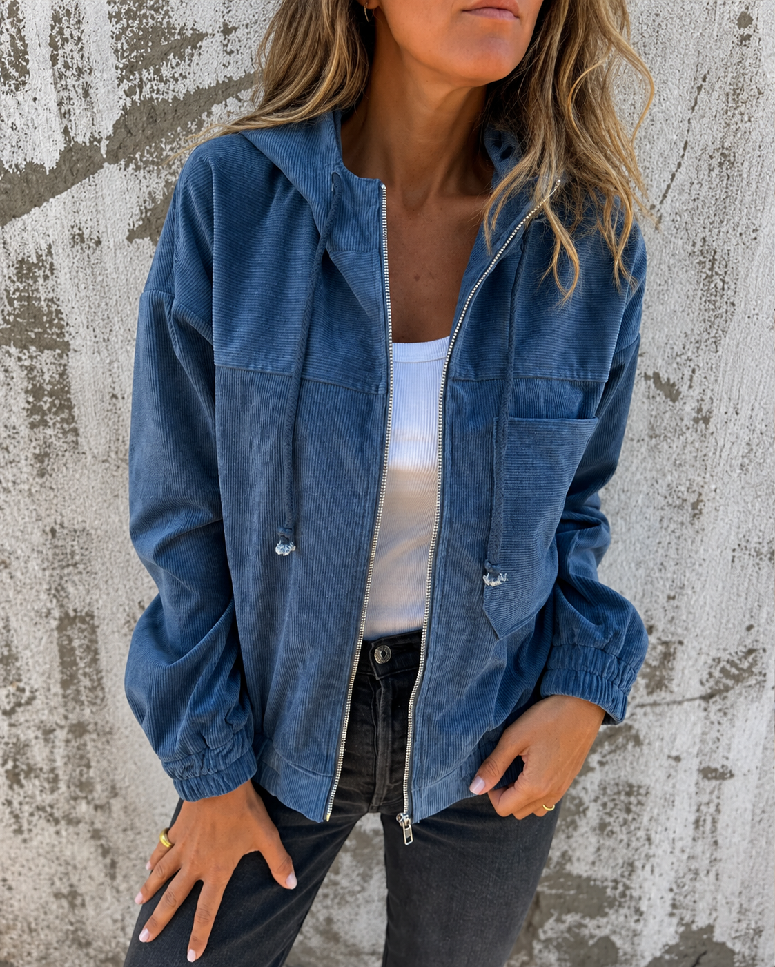 Natalie corduroy hooded zip-front jacket with side pockets and a relaxed fit