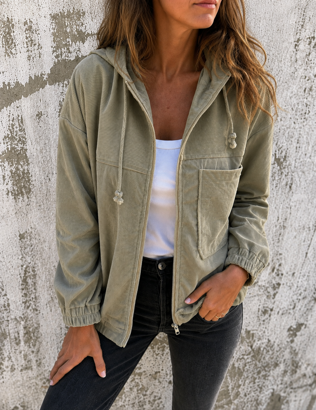 Natalie corduroy hooded zip-front jacket with side pockets and a relaxed fit