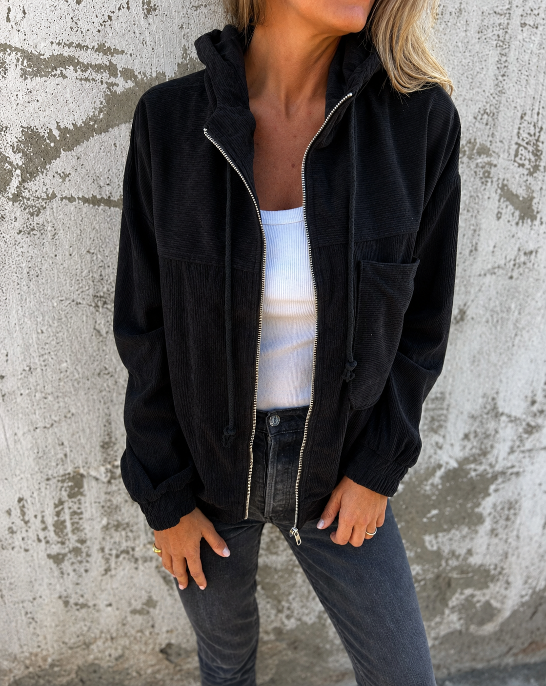 Natalie corduroy hooded zip-front jacket with side pockets and a relaxed fit