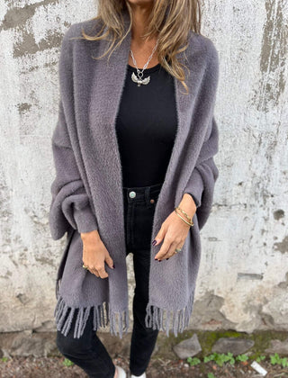 Women's long fringed knit cardigan with plush texture and draping silhouette