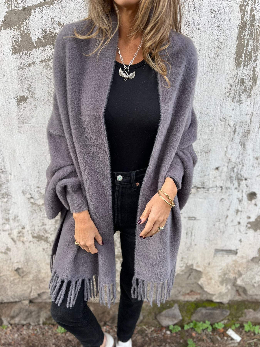 Women's long fringed knit cardigan with plush texture and draping silhouette