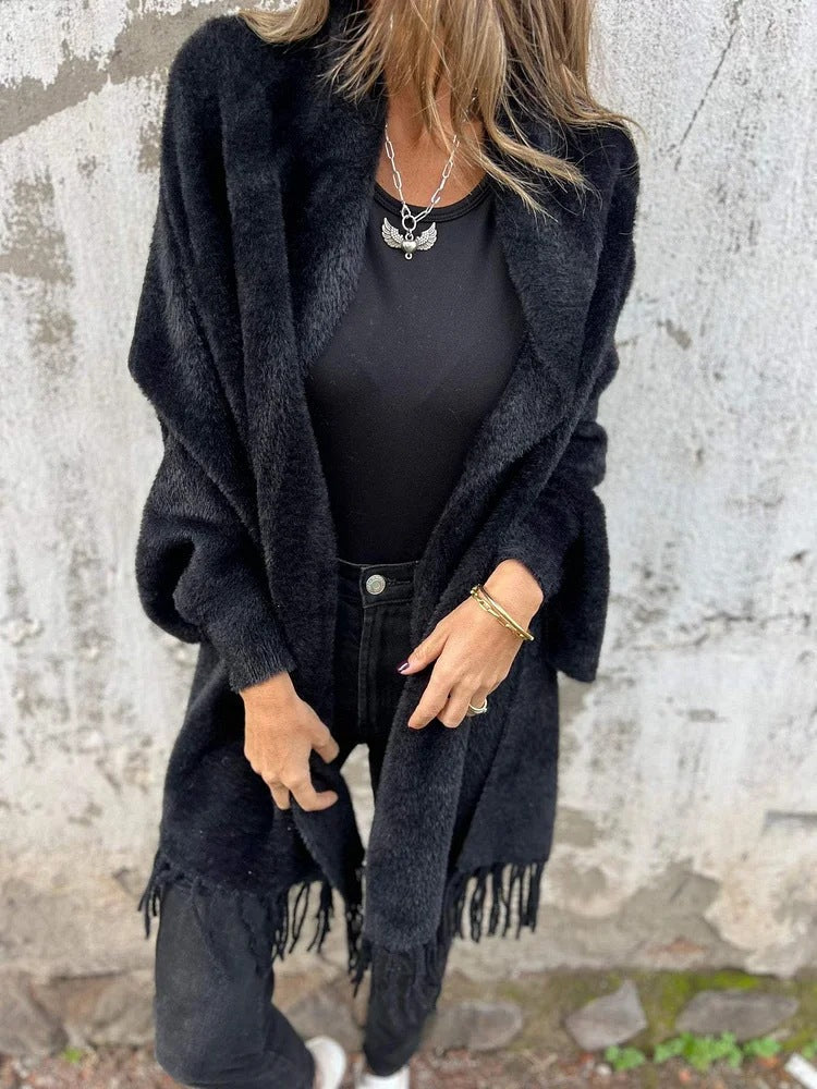 Women's long fringed knit cardigan with plush texture and draping silhouette