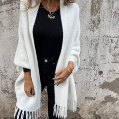 Women's long fringed knit cardigan with plush texture and draping silhouette