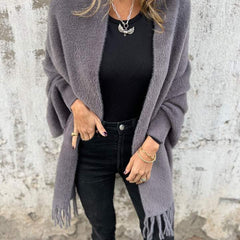 Women's long fringed knit cardigan with plush texture and draping silhouette