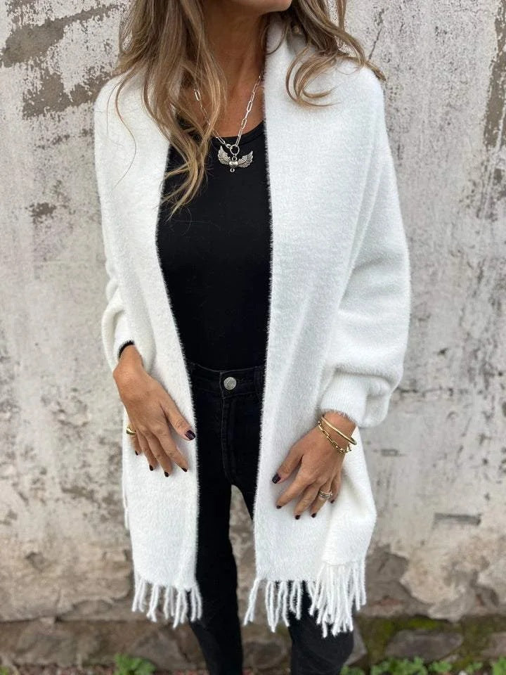 Women's long fringed knit cardigan with plush texture and draping silhouette