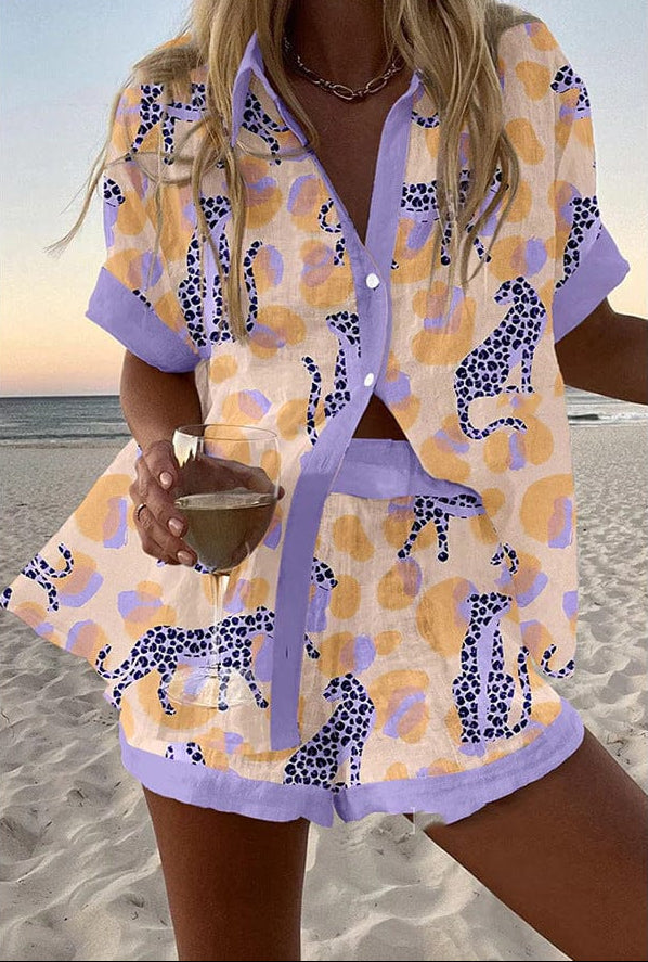 Cream two-piece set with navy cheetah print, T-shirt and shorts with lavender trim