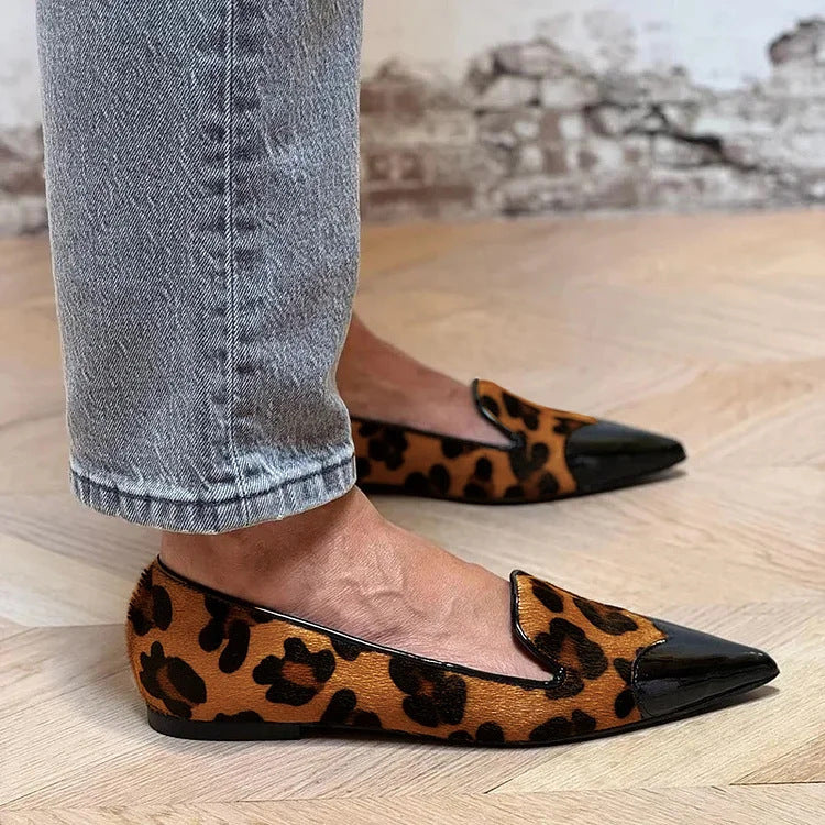 Animal print ballet flats with a glossy contrasting black toe