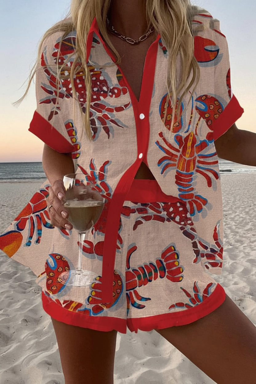 Cream coordinated shirt and shorts set with an all-over red lobster print and red trims