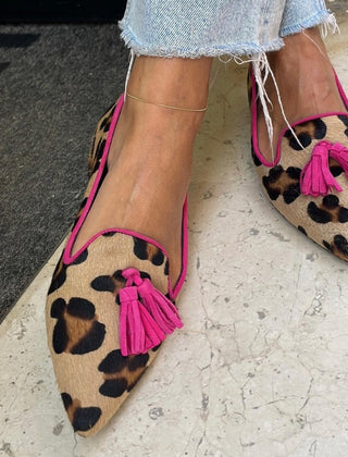 Leopard print ballet flats with tassel detailing and contrasting trim