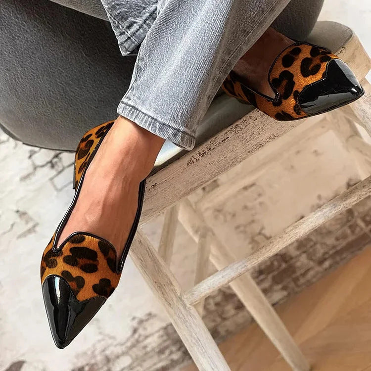 Animal print ballet flats with a glossy contrasting black toe