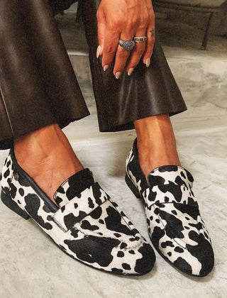 Black and white animal print women's loafers