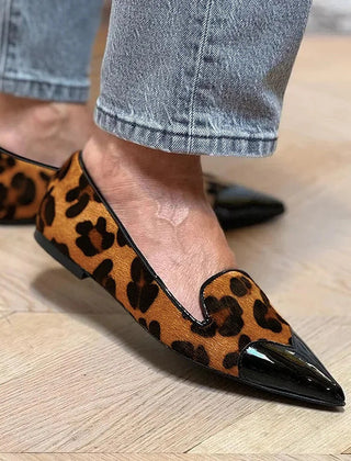 Animal print ballet flats with a glossy contrasting black toe
