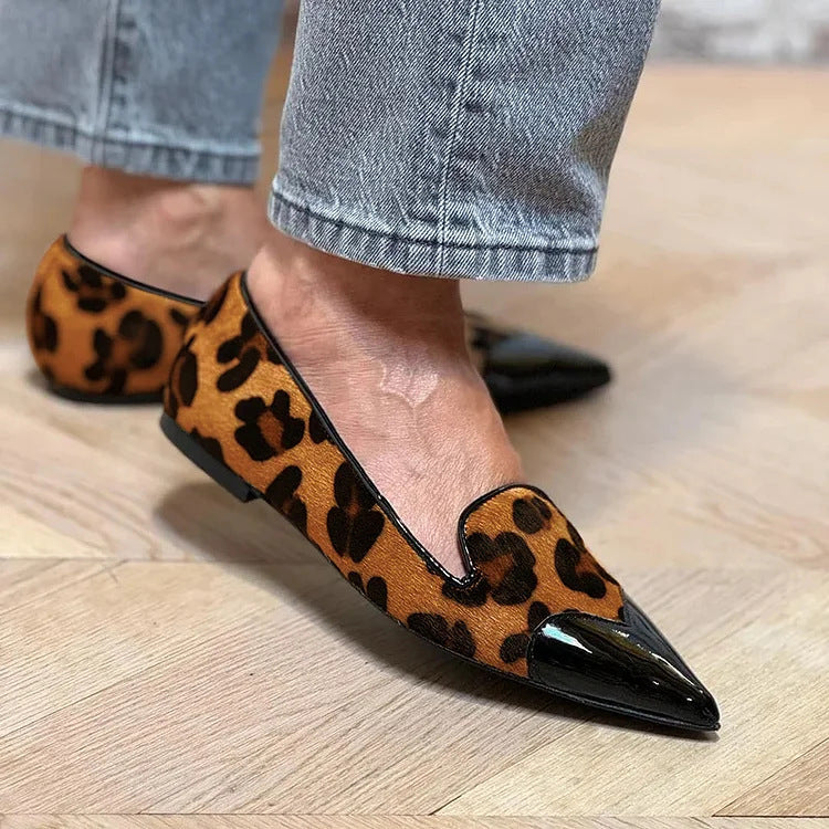 Animal print ballet flats with a glossy contrasting black toe