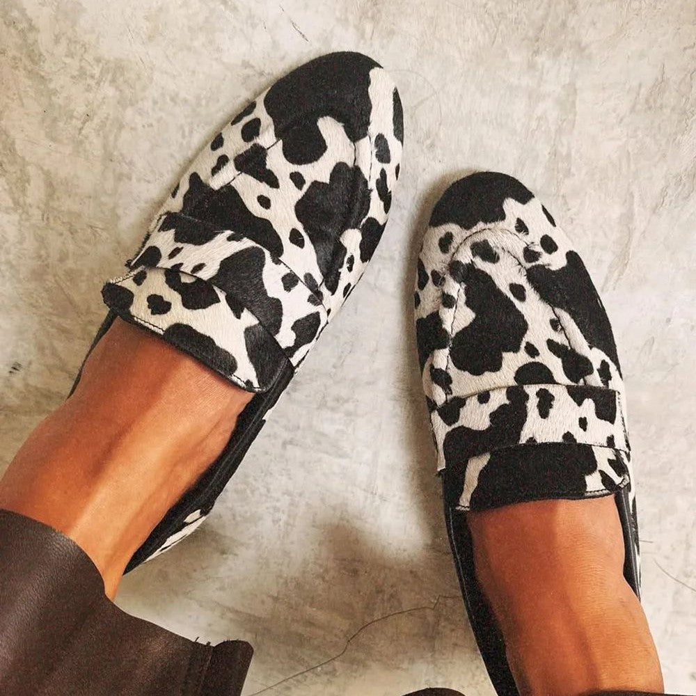Black and white animal print women's loafers