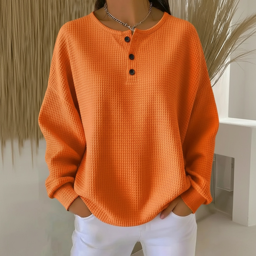 Women's waffle knit button-front sweatshirt with round neck and long relaxed drop-shoulder sleeves