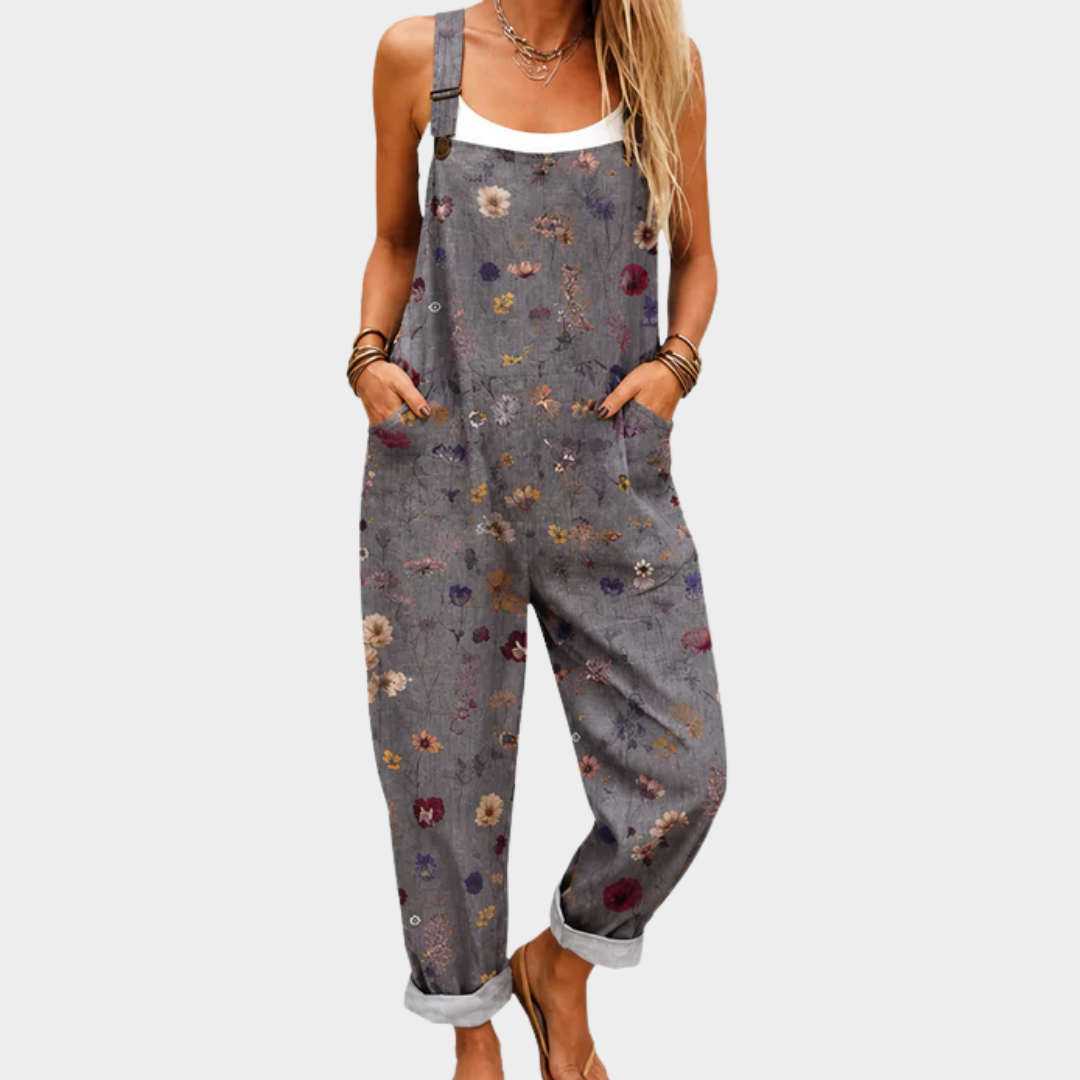 Printed wide-leg jumpsuit with adjustable straps and a loose, flattering fit